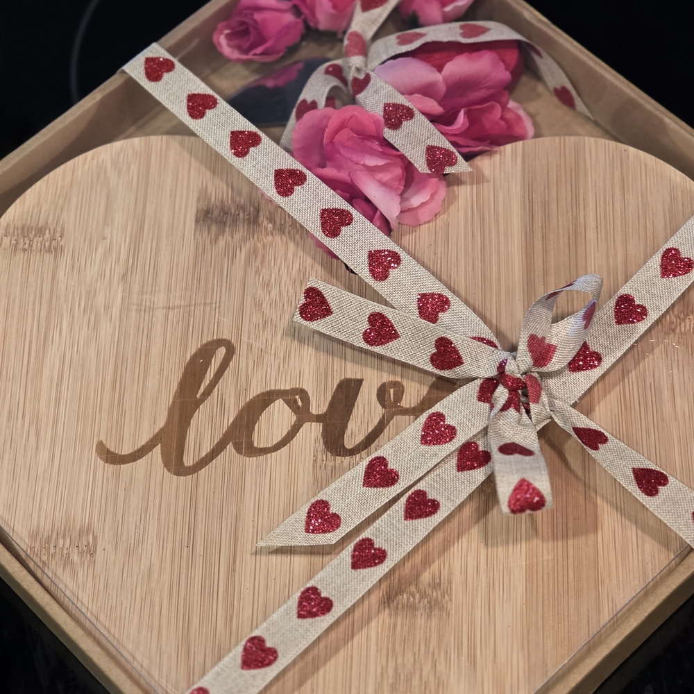 Heart-Shaped Bamboo Cutting Board with Red Heart Ribbon